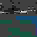 kom10