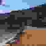 kom13